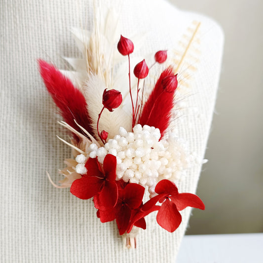 Rustic boho boutonniere in red with dried flowers