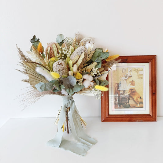 Handcrafted dried bouquet with native Australian flowers and soft textures a meaningful and lasting gift for brides or anniversaries.