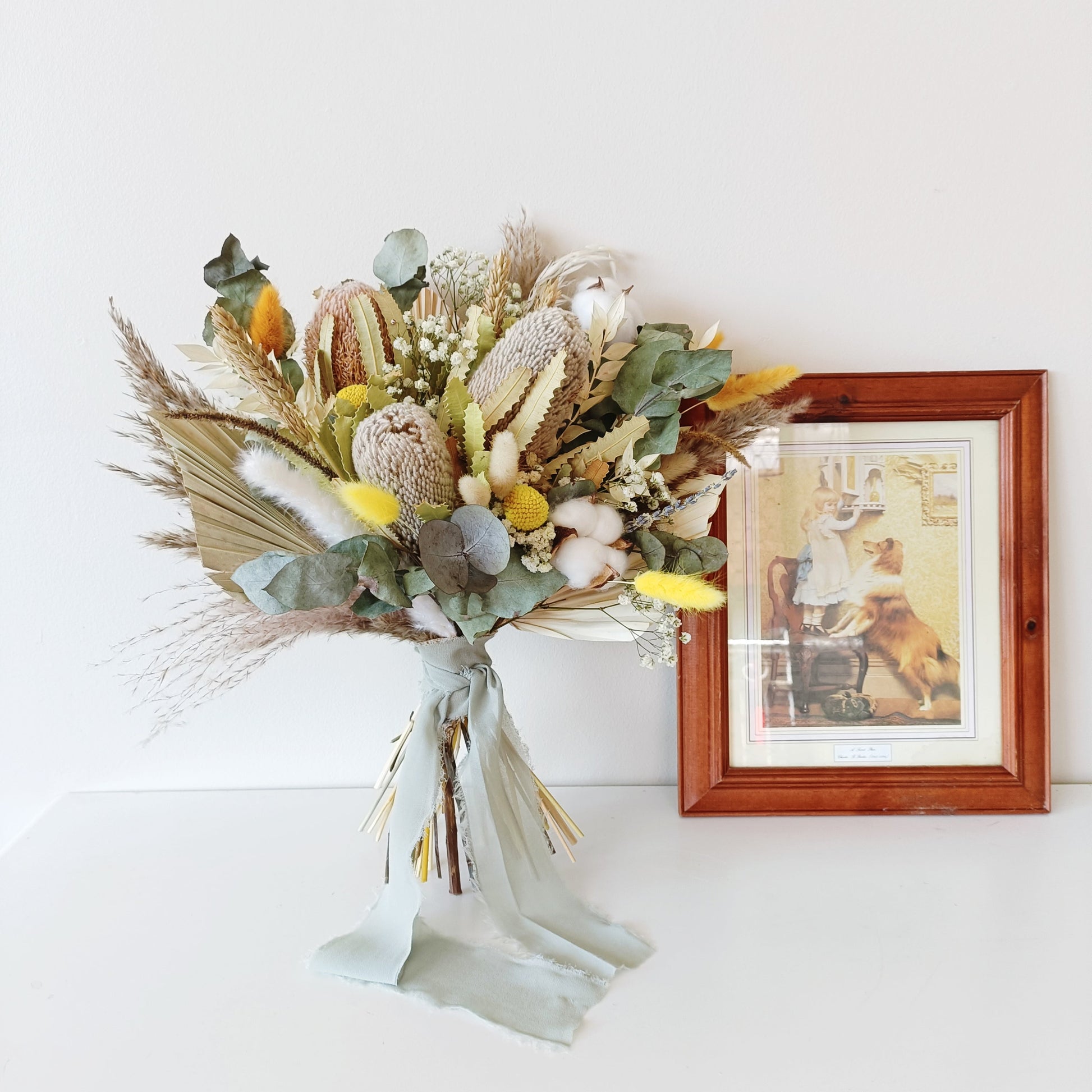 Handcrafted dried bouquet with native Australian flowers and soft textures â€“ a meaningful and lasting gift for brides or anniversaries.