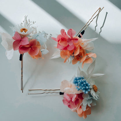 Set of bridal hairpins with pastel flowers in peach, pink and blue tones, handmade wedding accessories