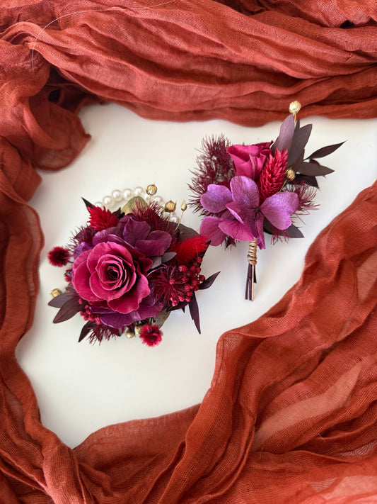 Burgundy corsage and boutonniere set with dried and artificial flowers, perfect for weddings and school formals