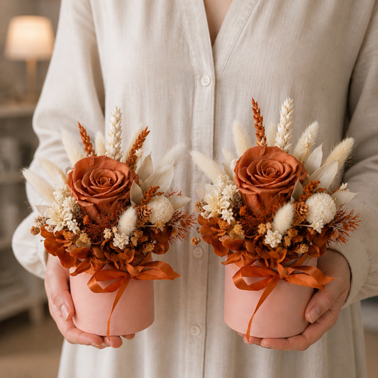 handmade dried flower mini pot gift with preserved rose arrangement in hands