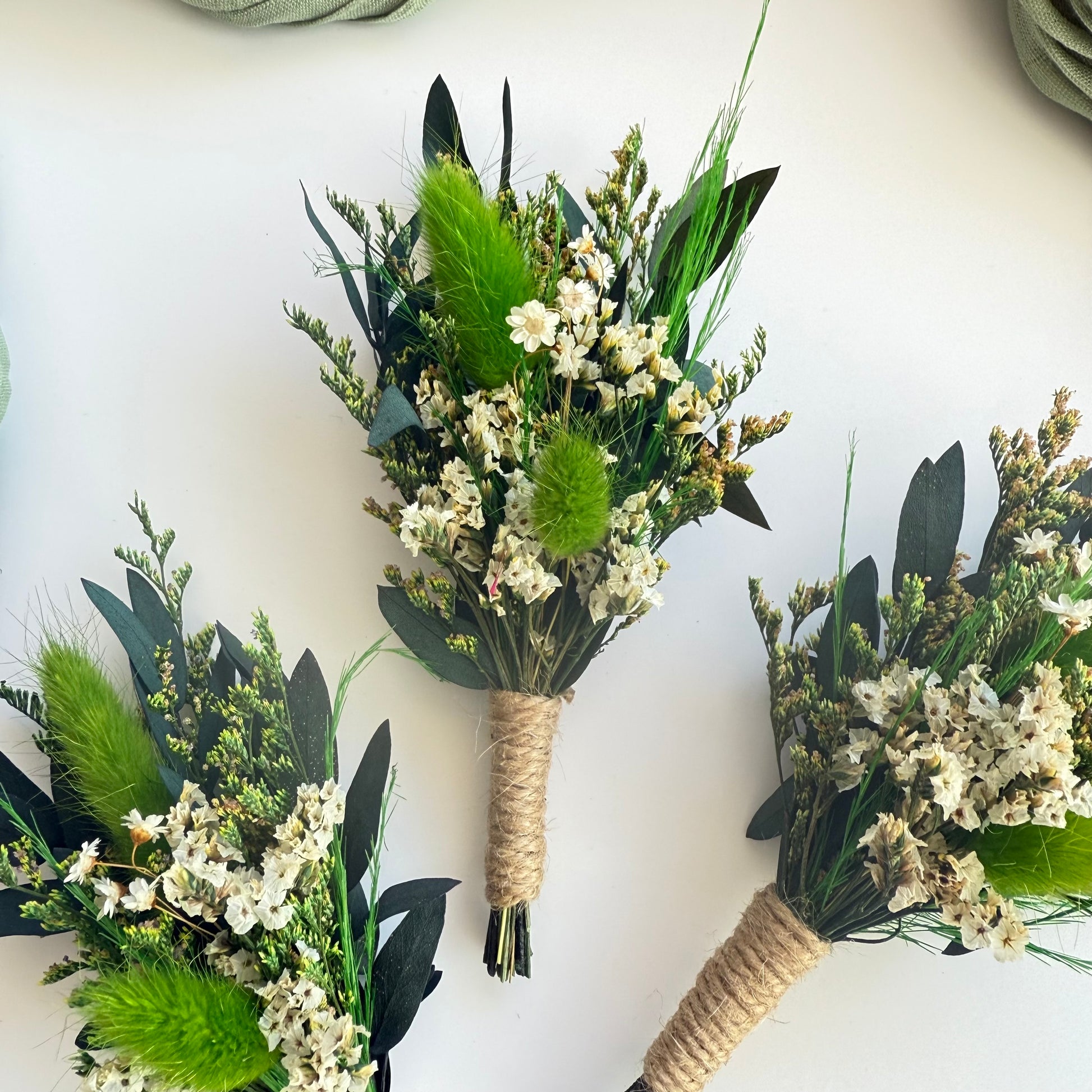 boho-greenery-boutonnieres-flatlay