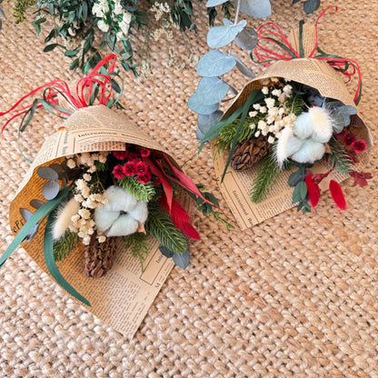 Dried flower mini bouquet in newspaper wrap — rustic Christmas arrangement with baby’s breath and preserved foliage