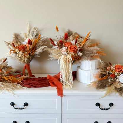Matching terracotta bouquet and boutonniere wedding set