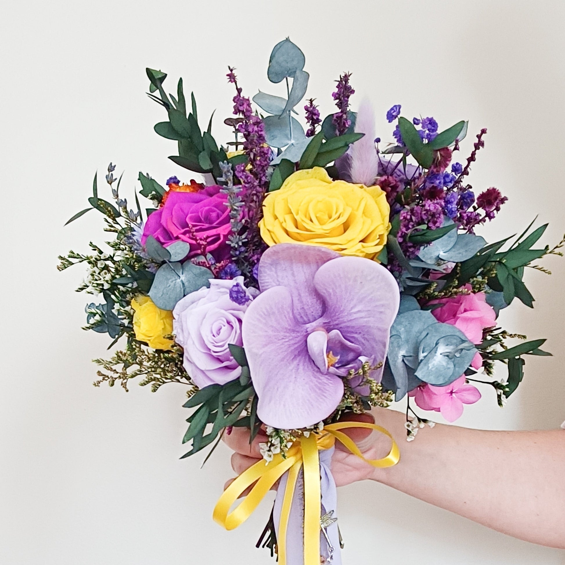 lilac and magenta dried wedding flowers
