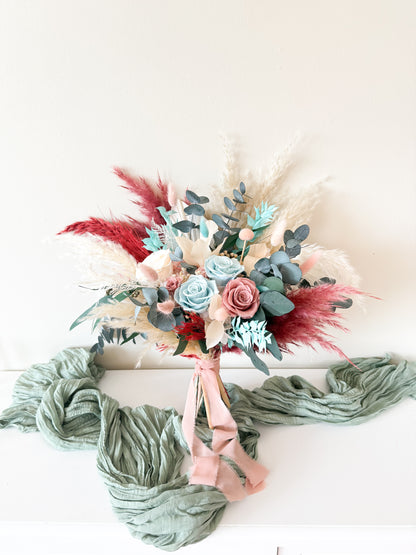 Preserved wedding bouquet closeup with seafoam, tiffany blue, and blush roses — boho rustic design from Sydney Australia