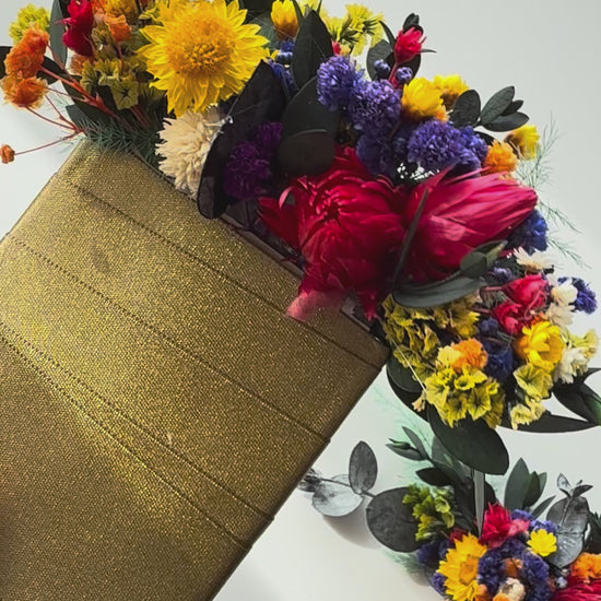 colourful dried floral pocket boutonnire