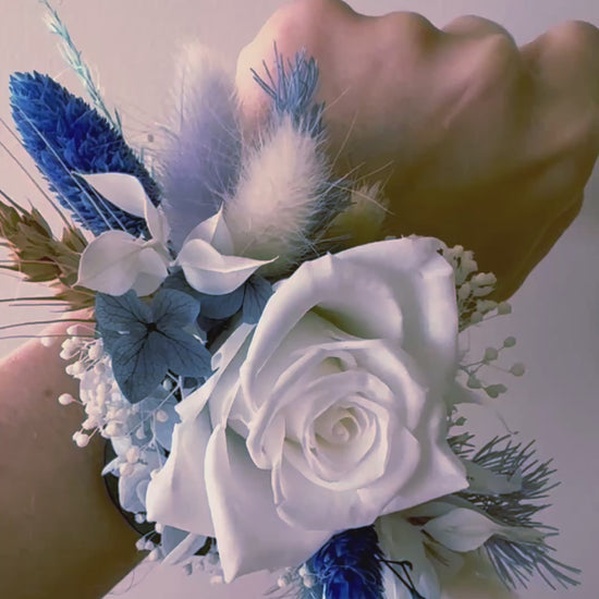 dried Floral Wrist Corsage on hand