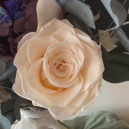  teal and navy dried flower bouquet in boho rustic style