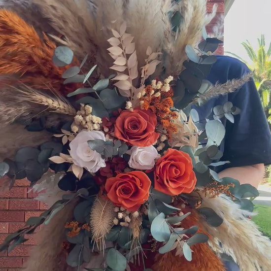 large-arbor-flowers-boho-wedding-arch-arrangement