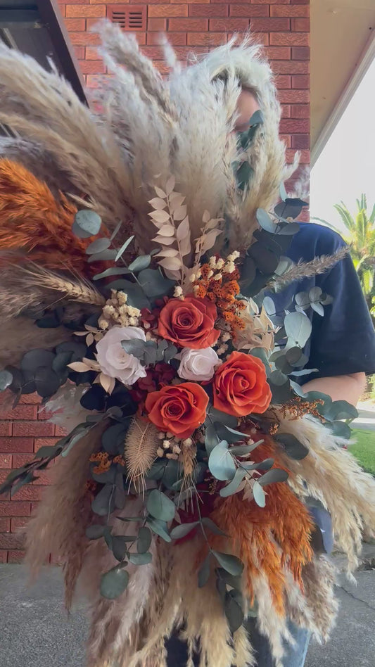 large-arbor-flowers-boho-wedding-arch-arrangement