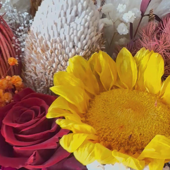 boho-bride-with-burnt-orange-sunflower-bouquet
