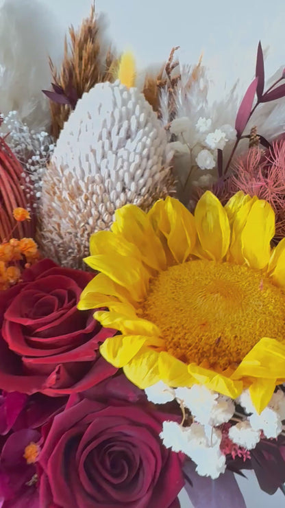 boho-bride-with-burnt-orange-sunflower-bouquet