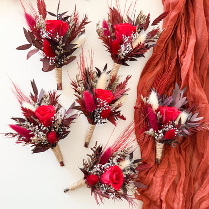 Set of dried flower boutonnieres with red sola wood roses, burgundy foliage, rustic twine wrap and boho accents, handmade groomsmen accessories for weddings, rustic style boutonniere set.