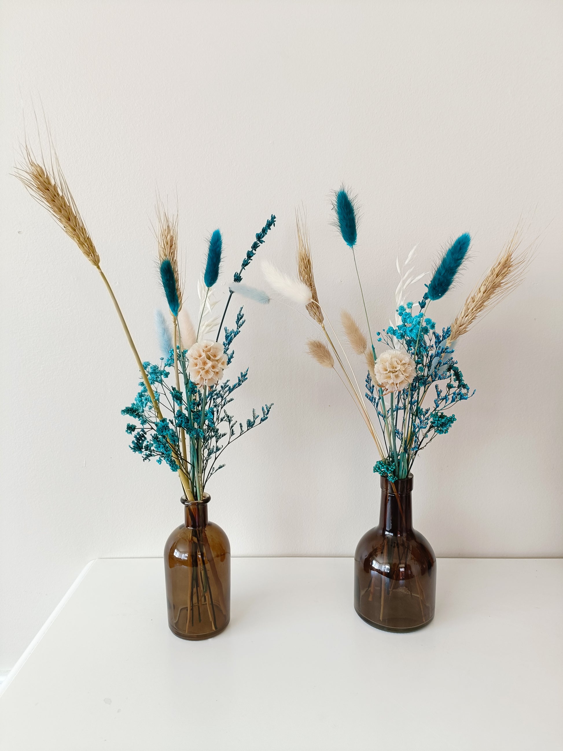 Teal bud vase, bud vase flowers, teal floral decor, mini vase arrangement, small flower bouquet, elegant table decor, wedding bud vase, minimalist florals, teal wedding decor, rustic bud vase, floral table centerpiece, soft blue-green flowers, chic home decor, petite floral arrangement, boho bud vase