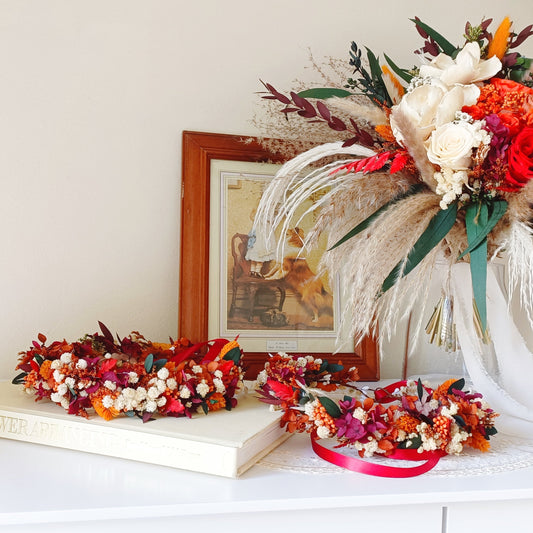 Rustic autumn dried flower crown and matching floral accessories in burgundy, orange, ivory and green wedding colours
