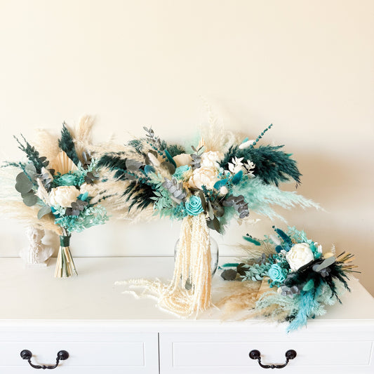 Rustic boho bouquet with teal and cream flowers for wedding decor
