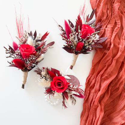 Rustic red rose boutonniere with dried flowers, burgundy tones and natural textures, handmade groomsmen accessory for rustic weddings, boho boutonniere decoration.