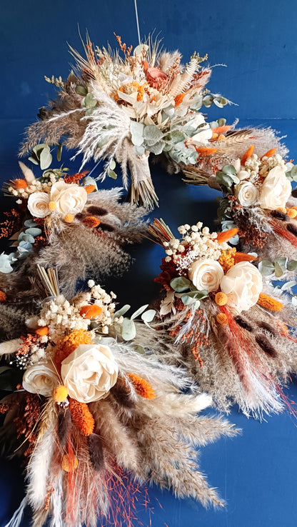 Handcrafted boho wedding bouquet made from premium dried flowers, featuring earthy colors and delicate textures. Perfect for an autumn or outdoor wedding