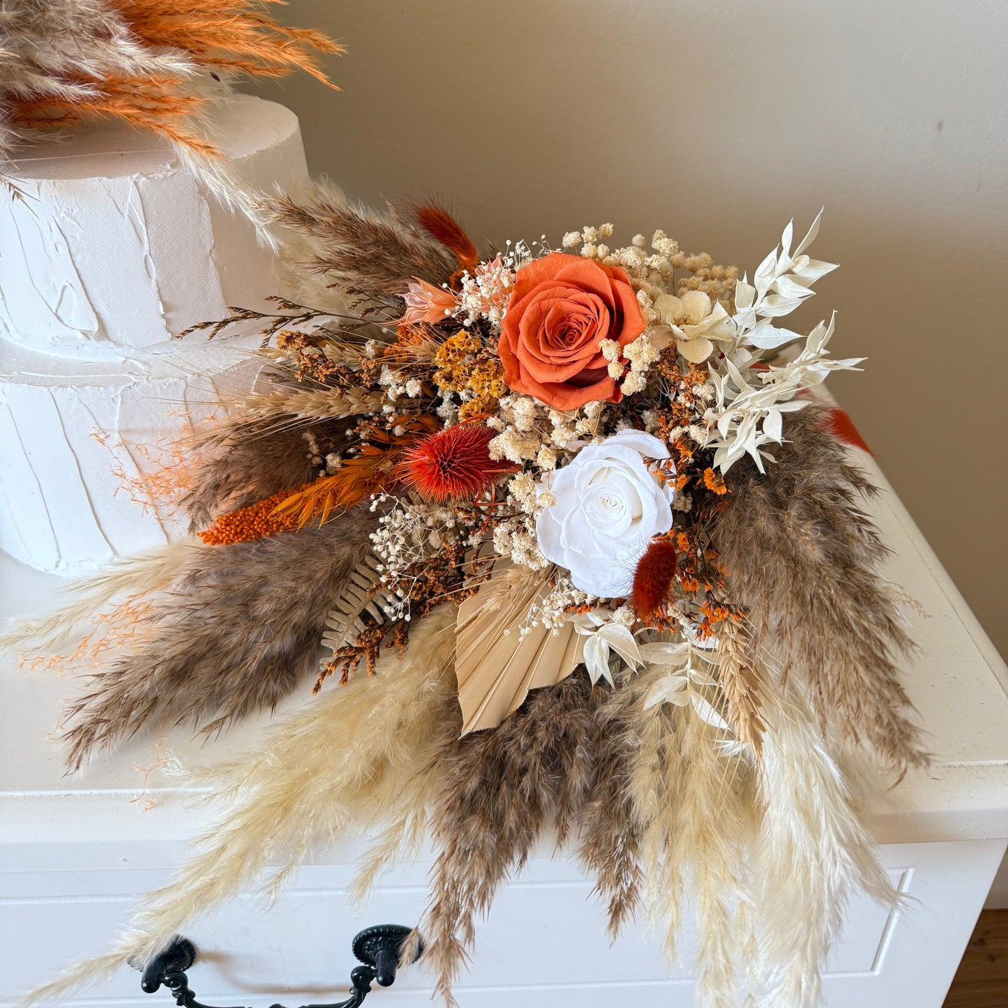 Detailed view of terracotta preserved wedding bouquet