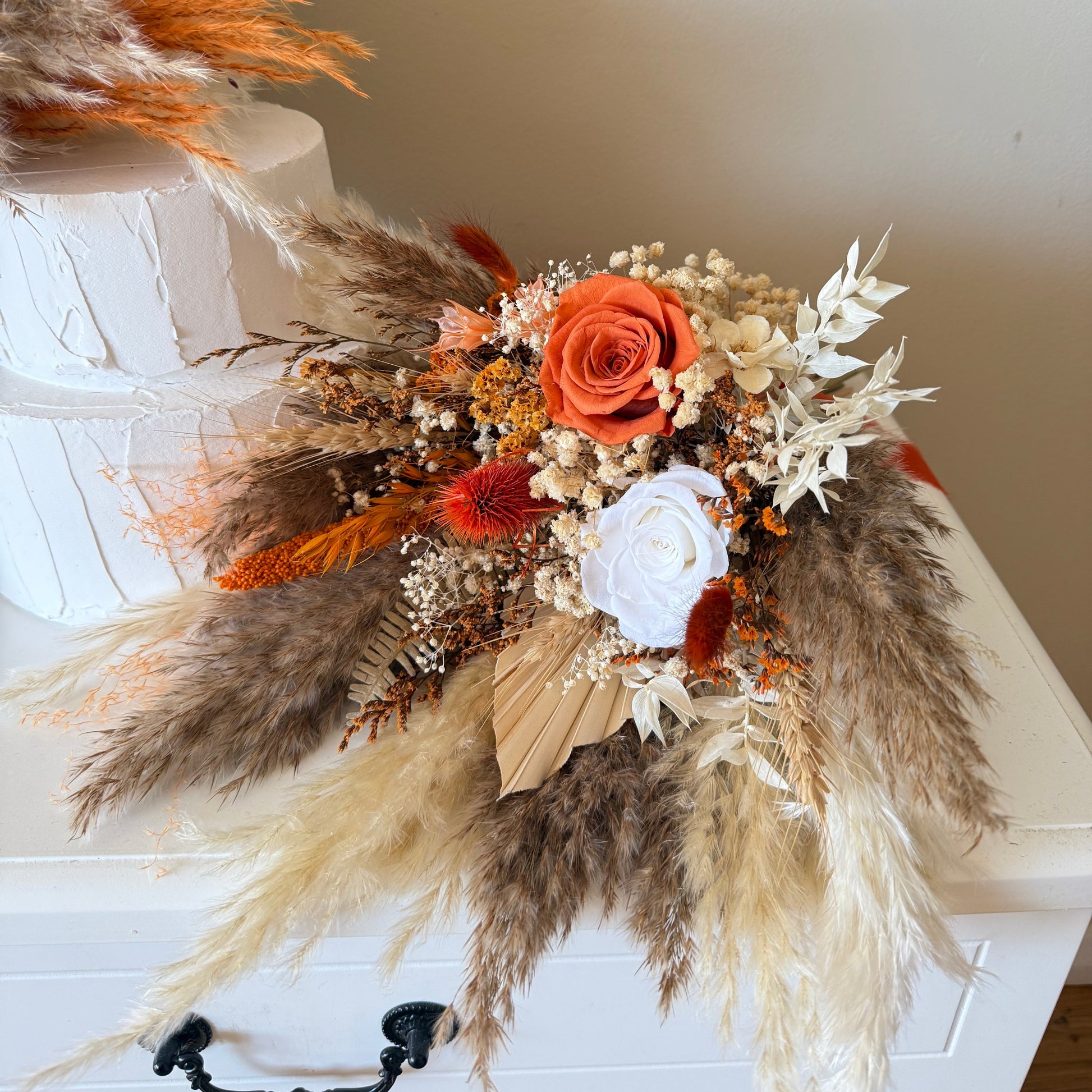 Detailed view of terracotta preserved wedding bouquet