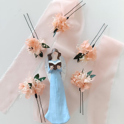 Romantic boho wedding hairpins made with preserved flowers and greenery in soft pastel tones