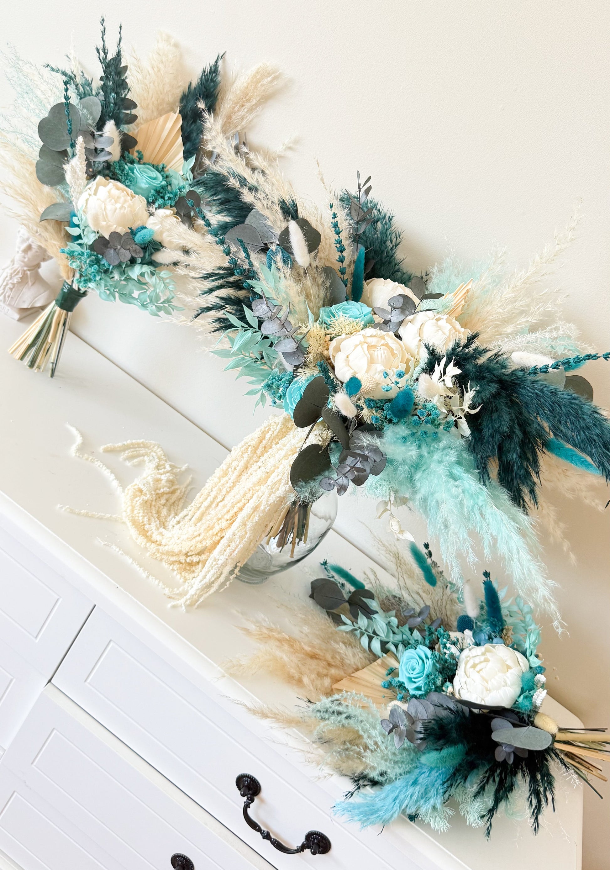 Boho wedding flower set with teal bouquet and matching floral accessories