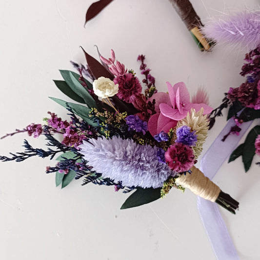 Handmade wedding buttonhole in lavender, burgundy and blush tones with preserved florals