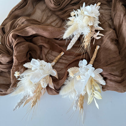 White and ivory dried flower wedding boutonnieres with preserved hydrangea, pampas grass and natural dried foliage
